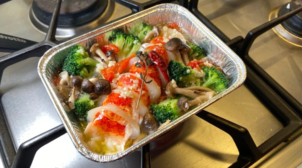 自家製 オマール海老と猿払産ホタテのアヒージョ ｜ア・ターブル！